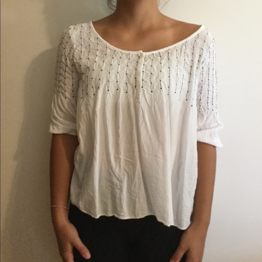 Super cute and soft white flowy top